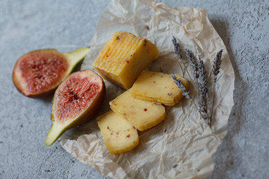 food photo rustic Breakfast cheese and figs and lavender in Provence style