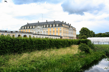 Old German castle with garden in front of it