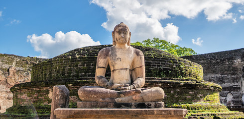 view on old statue of Buddha in Sri Lanka
