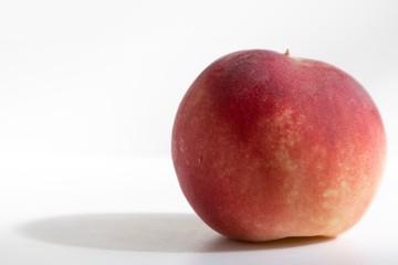 fresh red peach isolated on white background
