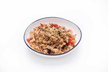 fried rice with tomato and mushroom on isolated white background