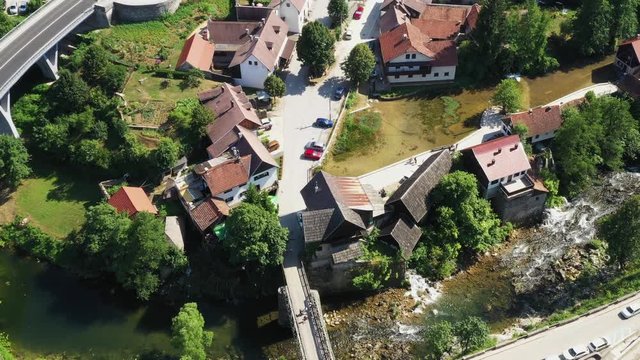 Croatia, Rastoke, traditional village near Slunj in Croatia, old water mills on waterfalls of Korana river, beautiful countryside landscape, aerial drone circle shot