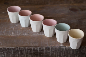 making objects with clay and tools. close up cropped photo about ceramics.