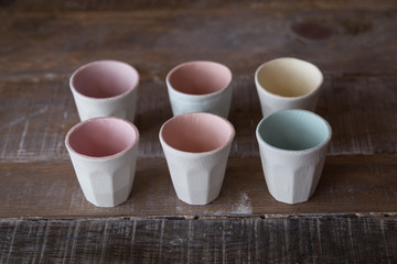 making objects with clay and tools. close up cropped photo about ceramics.