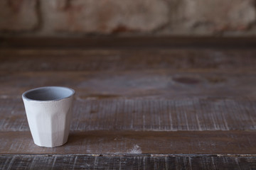 making objects with clay and tools. close up cropped photo about ceramics.