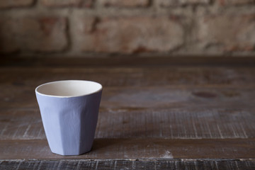 making objects with clay and tools. close up cropped photo about ceramics.