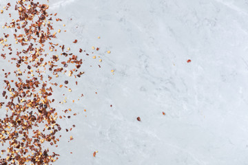Chili paste mix with peppers on stone background. Peperoncino. This condiment is ingredient of harissa, ajika, muhammara or other middle east food