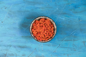 Traditional Maghrebi hot chili pepper sauce paste harissa. Marocco and arabic cuisine. Georgian adjika. Italian peperoncino sause