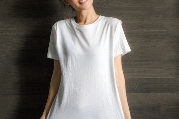 White T-shirt mockup with asian girl fashion portrait - shirt mockup model copy space dark back ground