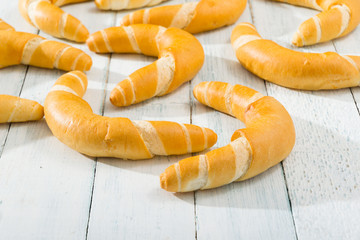 crescent rolls on white wooden table