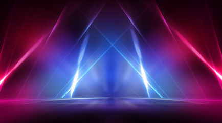 Empty stage, blue and pink, purple  neon, abstract background. Rays of searchlights, light, abstract tunnel, corridor.