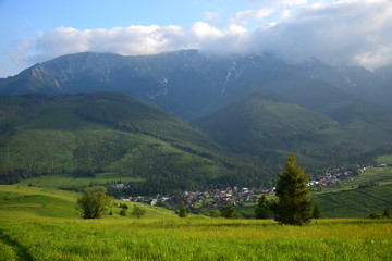 The small town Zdiar, surrounded by beautiful landscape and the Tatra mountains.