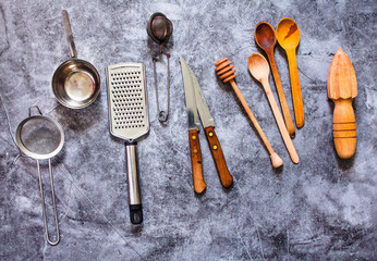 Metal and wooden kitchen utensils. Eco friendly Zero waste plastic free kitchen on gray  background. concept sustainable lifestyle or Recycling and ecology.