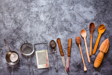 Metal and wooden kitchen utensils. Eco friendly Zero waste plastic free kitchen on gray  background. concept sustainable lifestyle or Recycling and ecology.