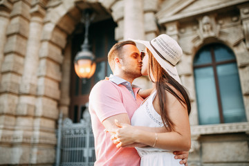 Happy couple at dawn strolling in Italy. Morning summer photo shoot in Rome.