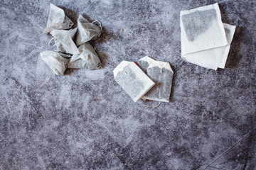 Pyramid and rectangle shaped tea bag mock up set on gray  background.