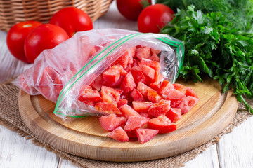 Frozen slices of red tomatoes