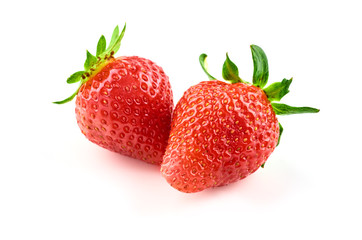 Two strawberry berries isolated on white background.