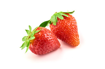 Two strawberry berries isolated on white background.