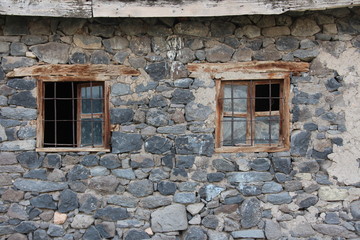 Fototapeta na wymiar old window in old stone wall