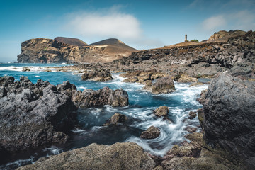 View over Capelinhos volcano, lighthouse of Ponta dos Capelinhos on western coast on Faial island,...