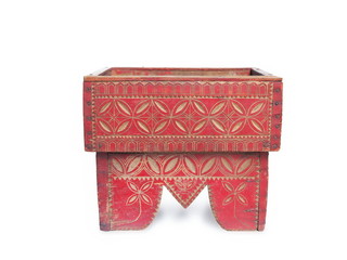 Ancient Wooden Betel nut receptacle object, 19th. Century with ancient line art, isolated on white background.