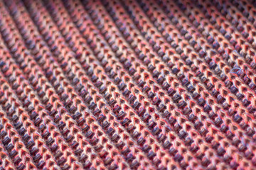 Multicolored knittwear background in soft light