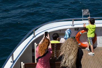 Obraz premium Close up of women's hands holding mobile phone with space screen, girl watching video,writing message,shopping online.