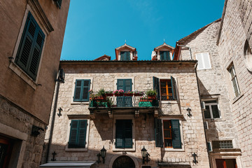 Old historical buildings in the central district of ancient city Kotor in Montenegro