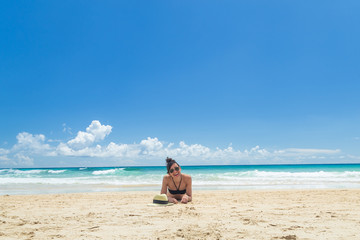 Fototapeta na wymiar Pretty young woman, enjoying on the beach in Fuerteventura, Canary Islands, Spain.