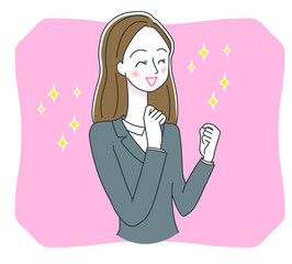 ガッツポーズをするビジネスウーマン