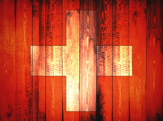 Flag of Switzerland,  wooden background, dirty.