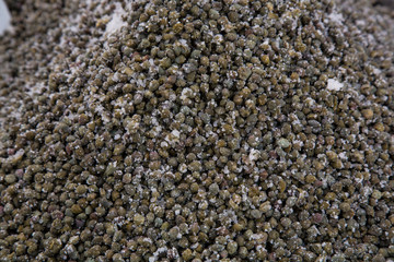 Salted capers on market place