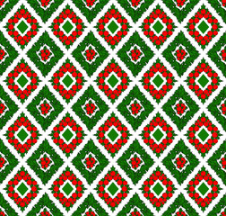 Vector seamless background with Holly leaves and berries