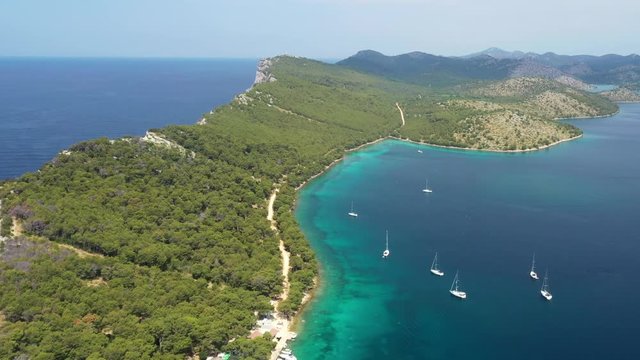 Cliffs above the sea on the shore of nature park Telascica, island of Dugi Otok, Croatia, beautiful seascape, drone aerial shot