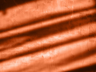 Wall background with shadow. Coral color background.