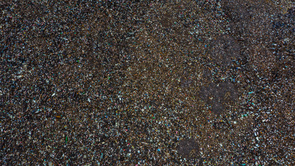 Aerial view glass bottles at the garbage dump, Recycling glass bottles.