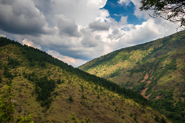 Obraz premium Mountain and forest, cloudy day with dark clouds. Near the Ibar river and Maglic castle in Serbia