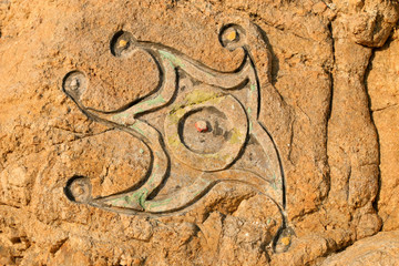 starfish pattern carved on the rock
