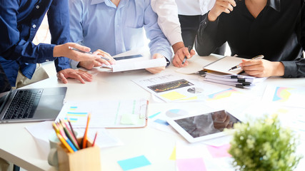 Strategy startup business with young businessman meeting on desk, Cropped shot photo.