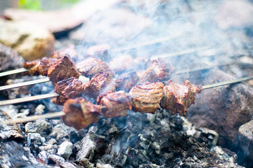 Grilled shish kebab on skewer. Roasted beef meat cooked at barbecue. Traditional eastern dish shashlik.