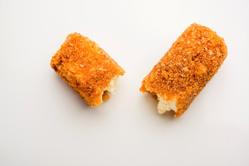 Kurkuri paneer fingers or pakora/pakoda snacks also known as Crispy Cottage Cheese Bars, served with tomato ketchup as a starter. selective focus