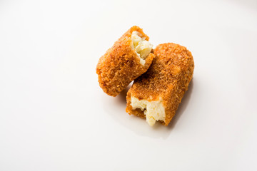 Kurkuri paneer fingers or pakora/pakoda snacks also known as Crispy Cottage Cheese Bars, served...