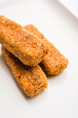 Kurkuri paneer fingers or pakora/pakoda snacks also known as Crispy Cottage Cheese Bars, served with tomato ketchup as a starter. selective focus