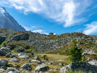 mountain landscape with pointed rock peaks in the distance