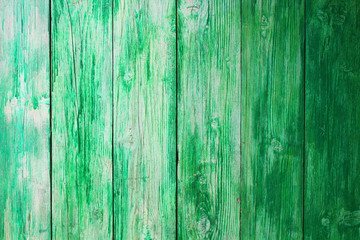 Fototapeta na wymiar Old green wooden boards. Vertical view. Close-up. Background. Texture.