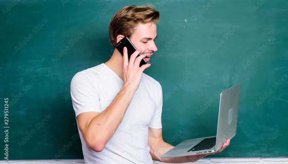 Wall mural digital concept. online communications. school teacher with laptop. advantage mobile internet. hands