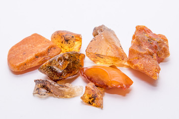 Amber Bernstein collection of beautiful pieces in different tones of yellow orange gold brown and copper isolated