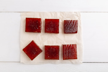 Red cubes of marmalade made from berries
