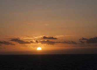 Fototapeta premium Golden orange lights at sunset at Cabo de San Vicente in the Algarve